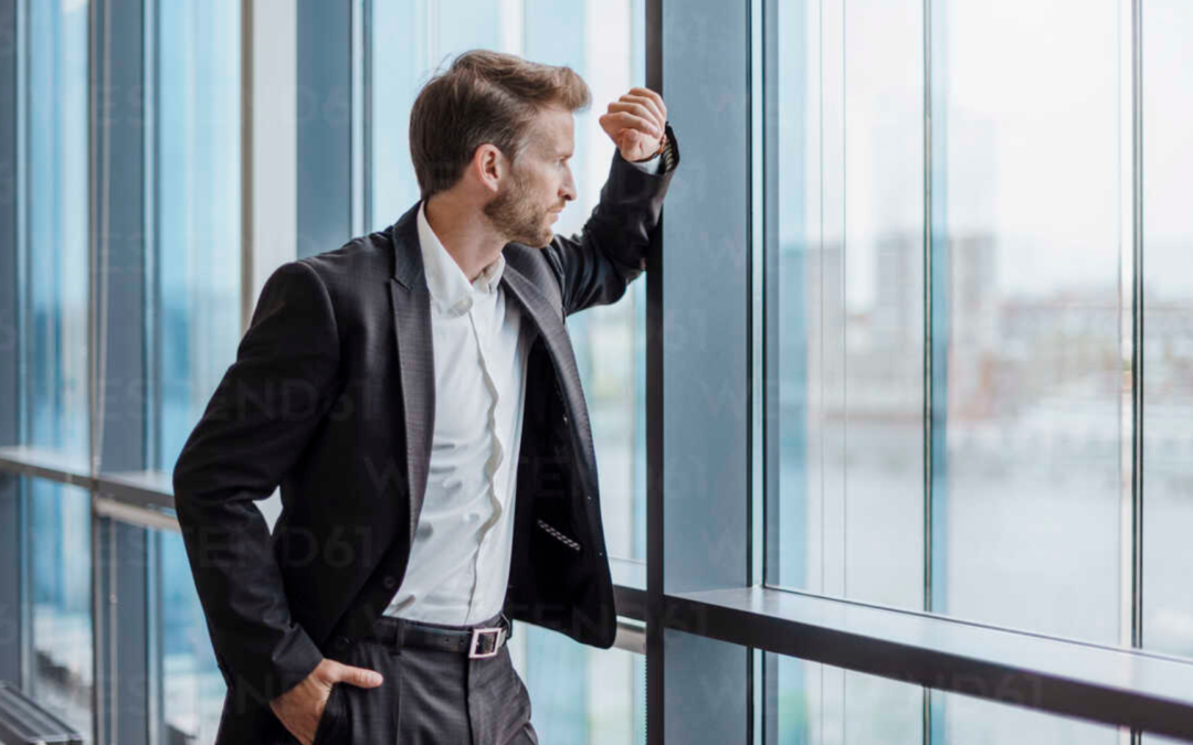Business owner looking out at a new horizon, symbolizing new beginnings after selling a business