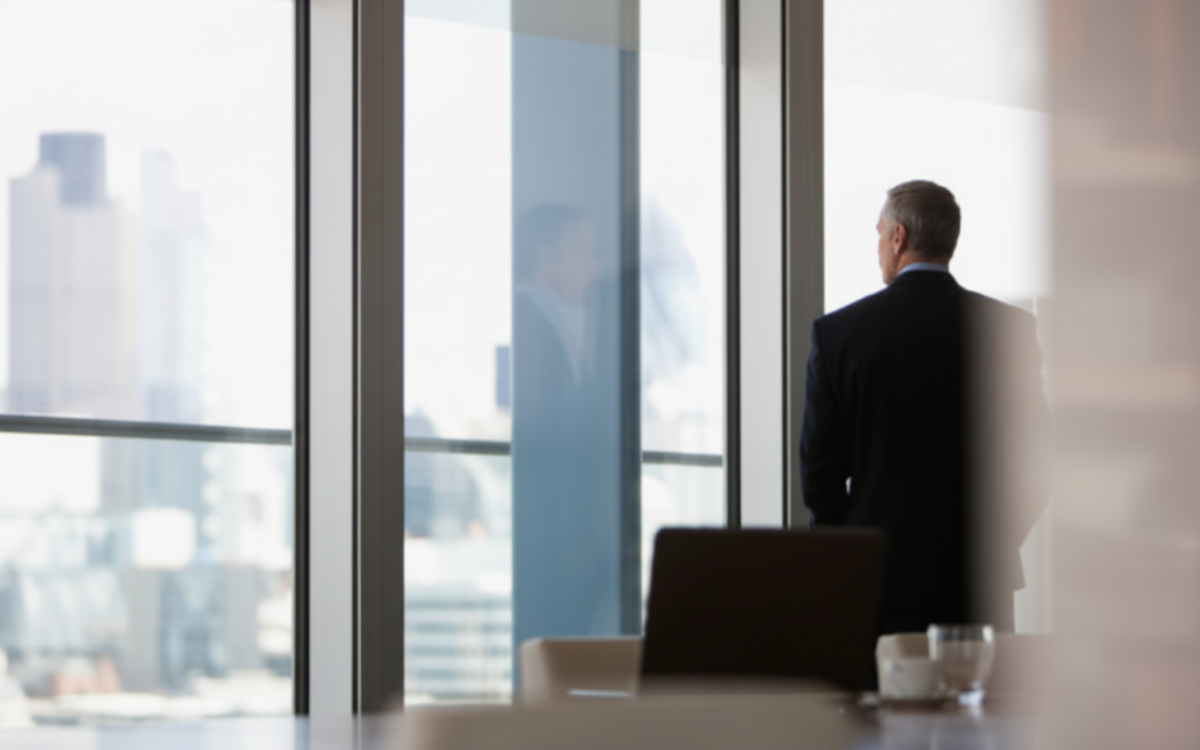 Business owner thoughtfully considering questions before selling their company